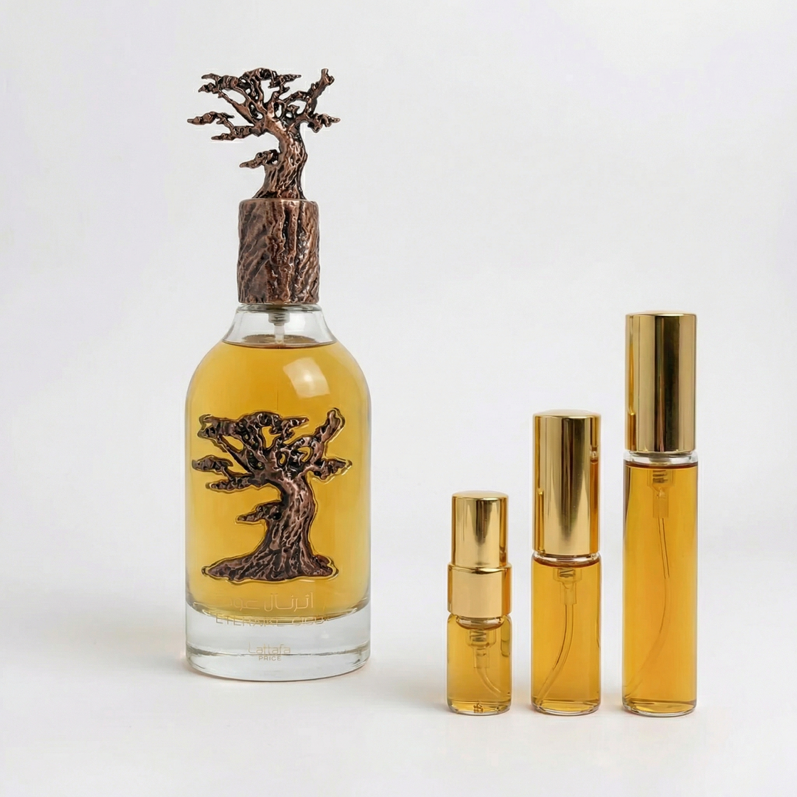 Décant Fragsplit d’Eternal Oud de Lattafa, parfum ambré boisé aux notes de prune, vanille et oud, à essayer sur la peau en formats 1 à 10 ml.