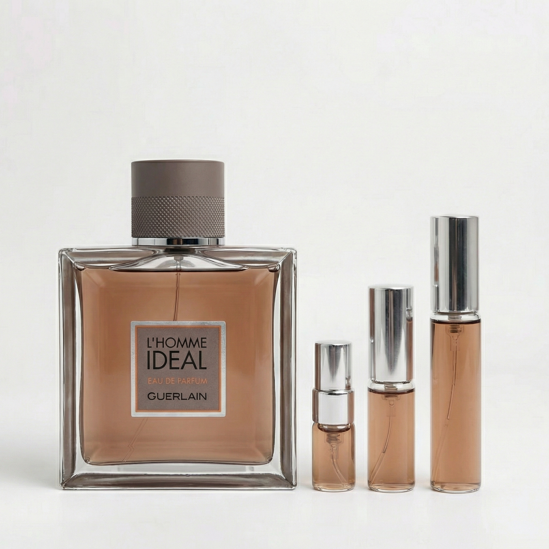 Décant Fragsplit de L'Homme Idéal EDP de Guerlain, aux notes d'amande, cerise et vanille, en formats 1 ml à 10 ml, livré en Suisse et France.