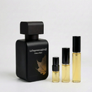 Décant Fragsplit de LaYuaqwam Tobacco Blaze de Rasasi, parfum unisexe aux notes chaudes de tabac, cuir et vanille, en formats 1 à 10 ml.