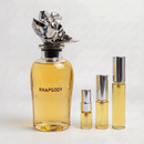 Décant Fragsplit de Rhapsody Louis Vuitton, parfum unisexe aux notes de maté, patchouli et mousse, en formats 1 ml à 10 ml.