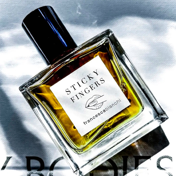 Sticky Fingers par Francesca Bianchi en décant Fragsplit de 1 ml à 10 ml, pour découvrir sur peau son cuir sombre, livré en Suisse et France.